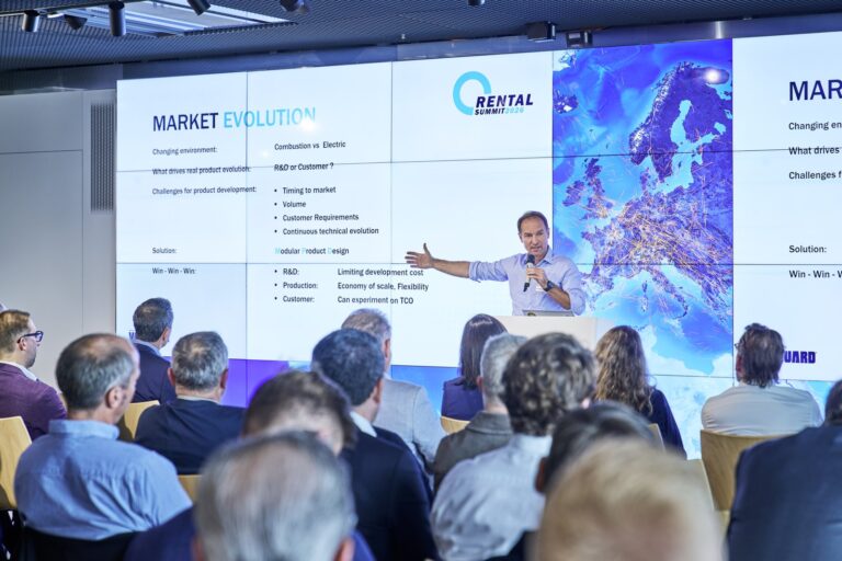 Rental Summit 2026 in Frankfurt: a speaker presents on market evolution and modular product design to delegates.