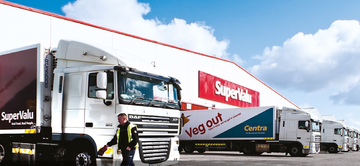 Musgrave SuperValu and Centra trucks lined up at a distribution depot