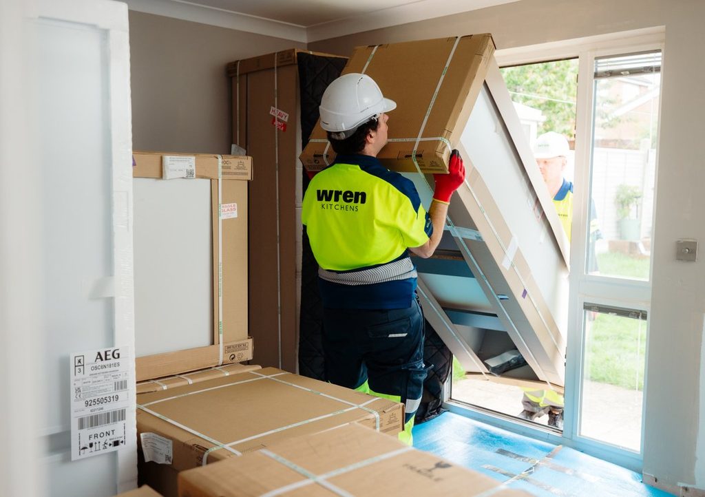 Wren Kitchens Motor Transport Awards: a Wren two-person delivery team unloading a kitchen into a customer’s home